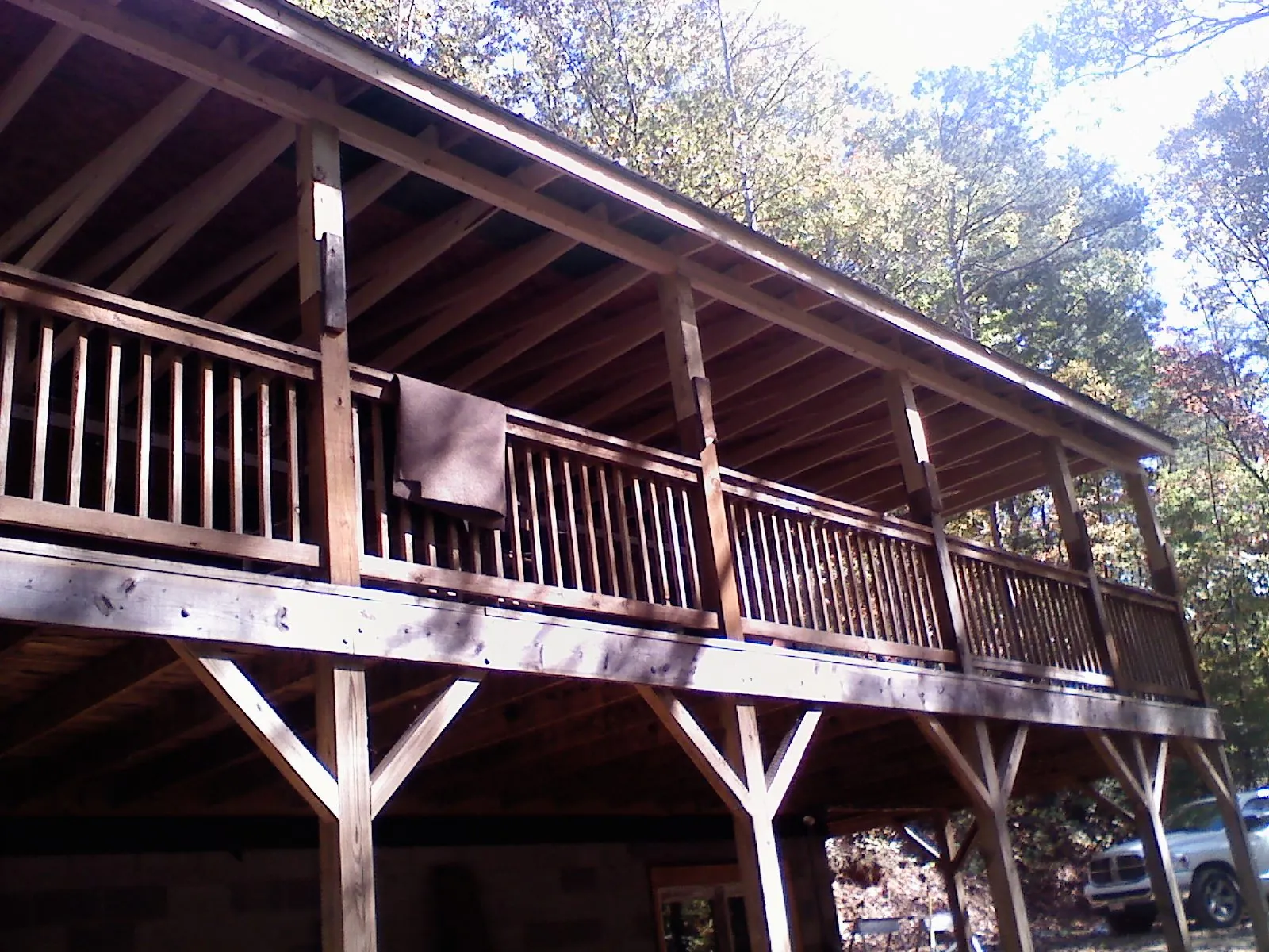 Timber framing under a new elevated porch and deck — Roof Leak Repair in Cortlandt Manor by Roofing Brothers